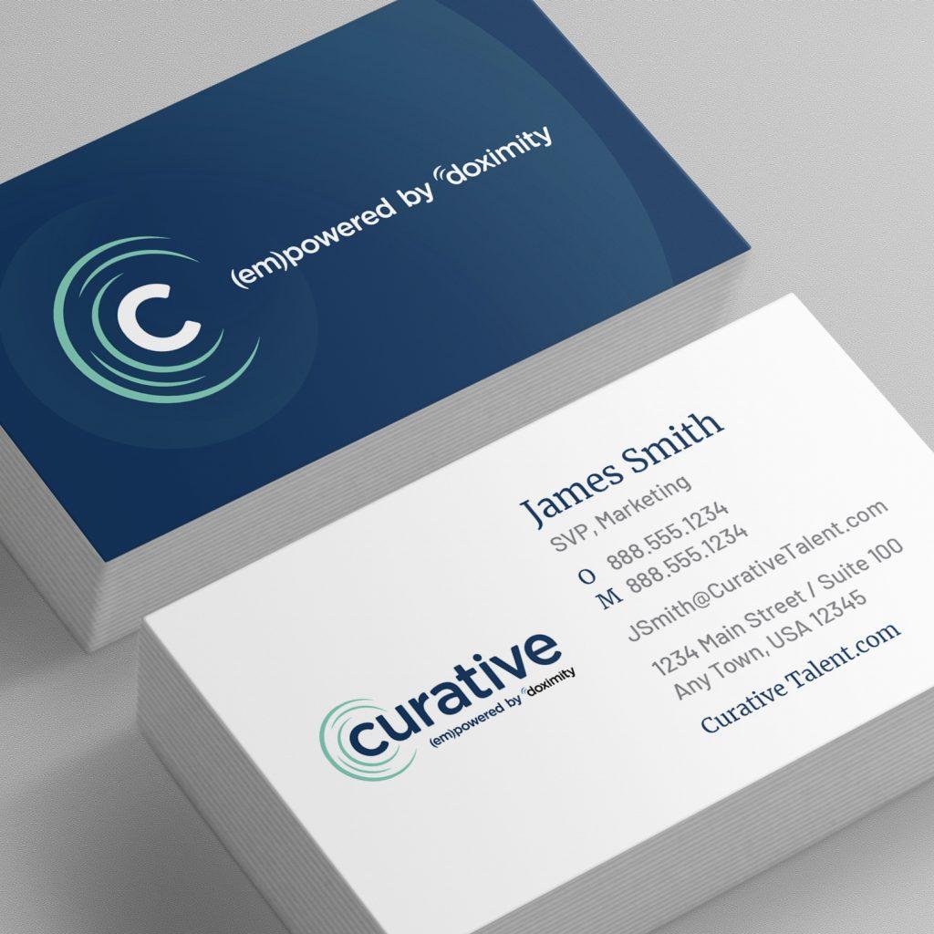 Two examples of business cards, branded with client Curative and company colors blue and white, with a sample of a worker's information