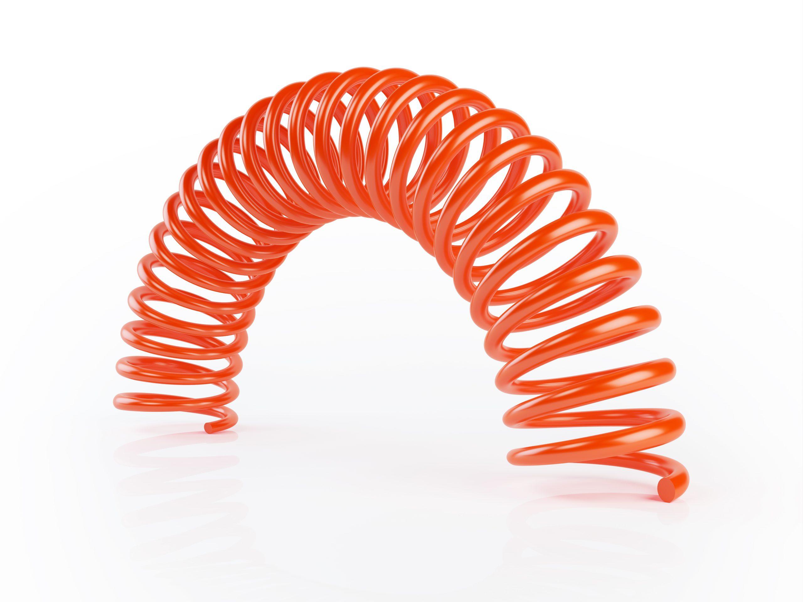High quality render of bending orange metal spring. Isolated on white background. Clipping path is included.